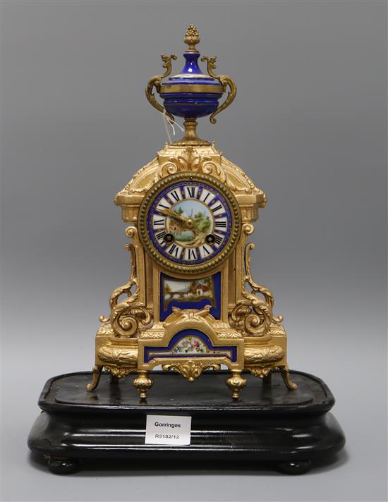 A late 19th century French gilt spelter and Sevres style porcelain eight day mantel clock, height 34cm excluding stand